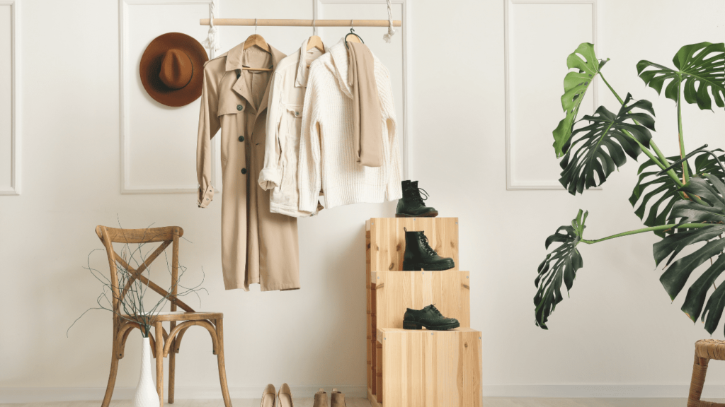 A well-organized and stylish tan wardrobe filled with a variety of clothing items, arranged by type and color, showcasing a creative approach to interior design.