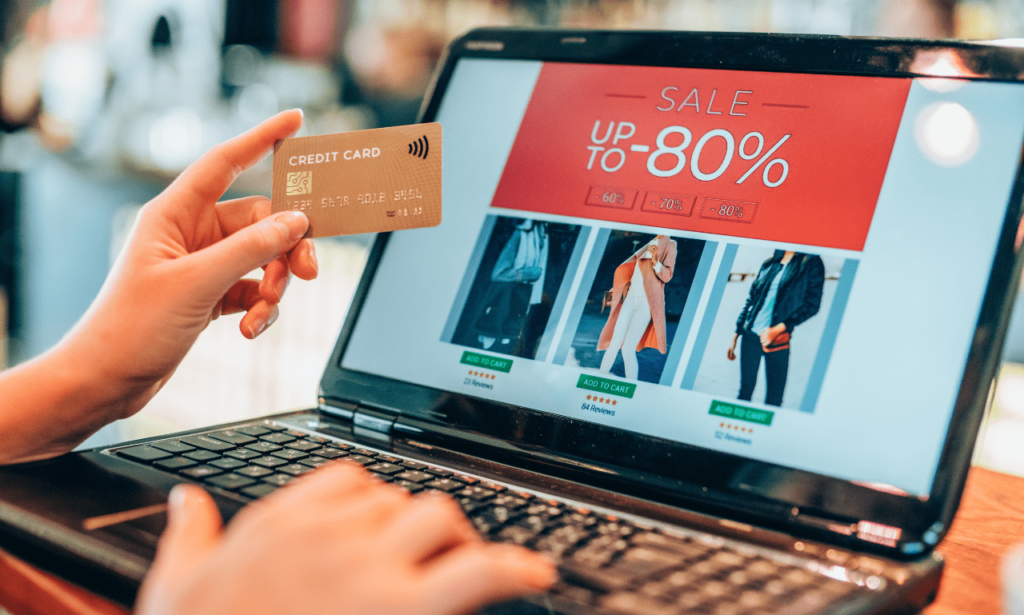 Completing an online purchase during a sale using a credit card for a seamless shopping experience.