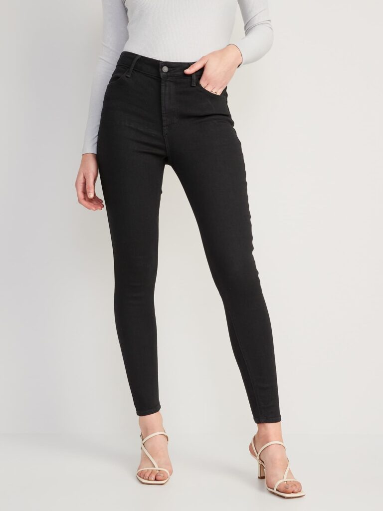 Woman in High-Waisted Black-Wash Super-Skinny Jeans for a Striking Look