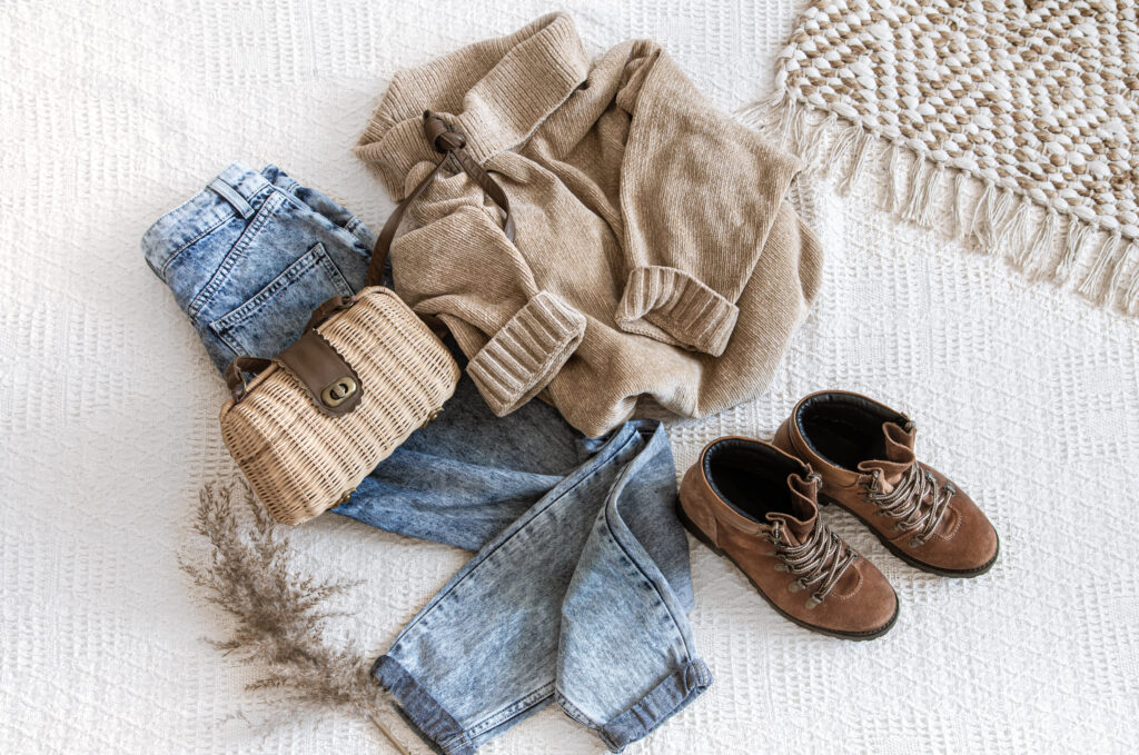 Fashionable women's jeans and sweater set in an image