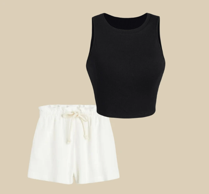 Cream-colored seamless tank top stylishly paired with coordinating paper bag waist shorts.