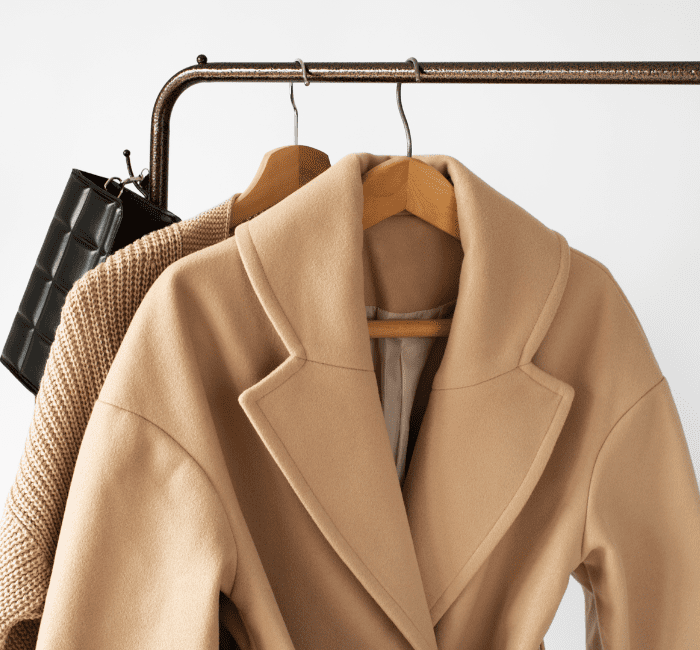 An affordable wardrobe displayed on a hanger with neutral colors
